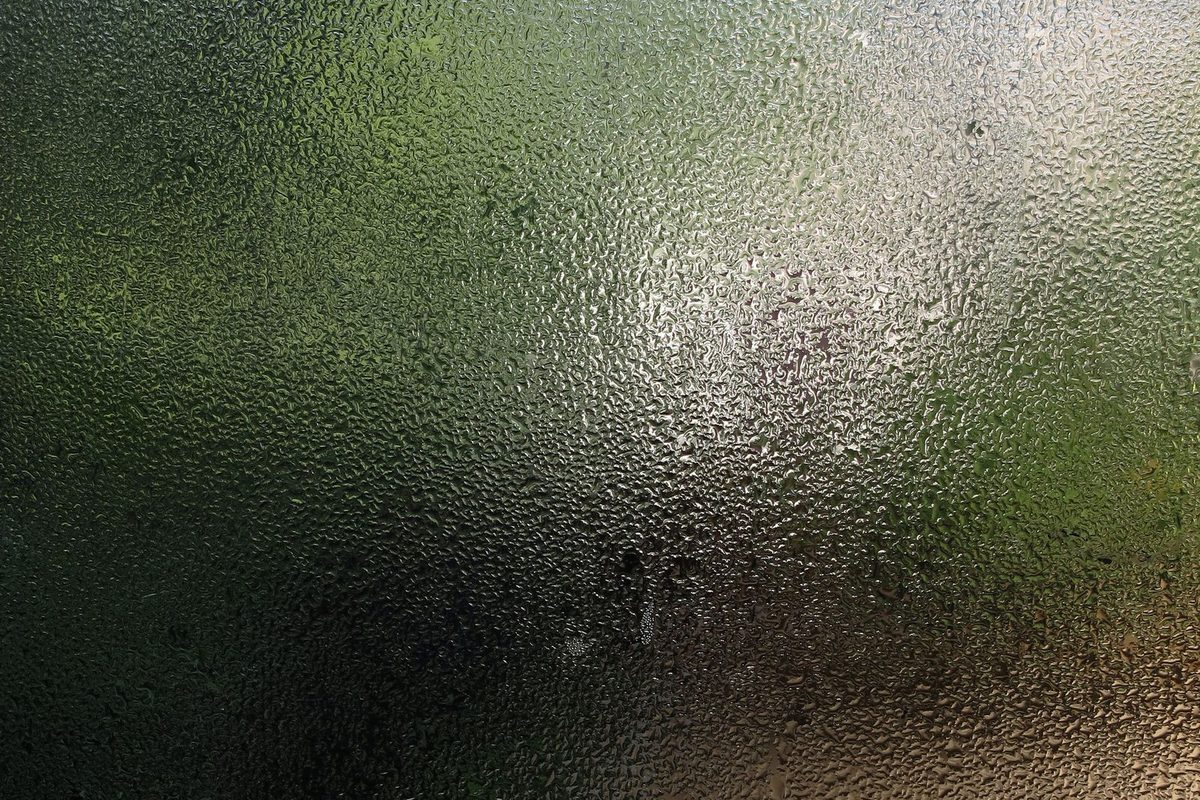 Water droplets of condensation on a window pane