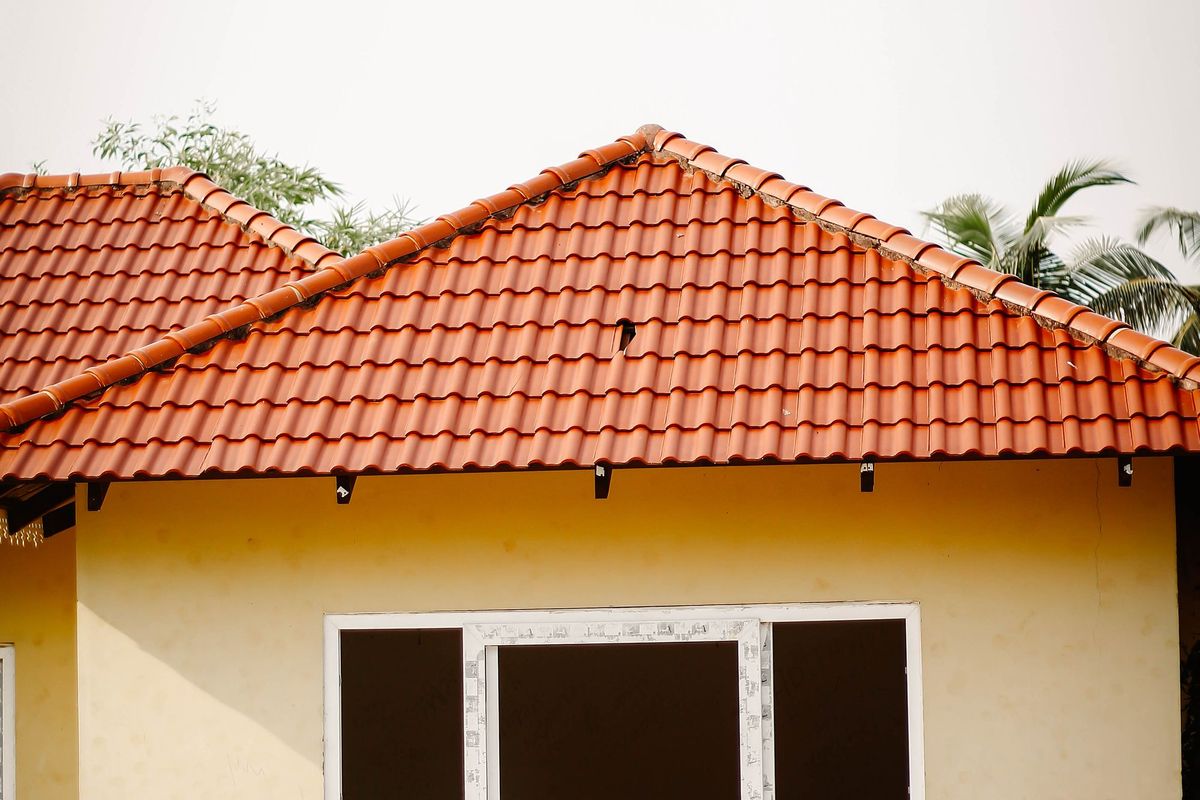 A house with a red clay tile roof